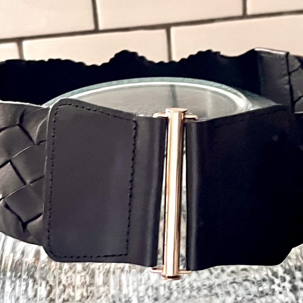 Wide black stretchy belt w/ leather weave detail, gold hardware.